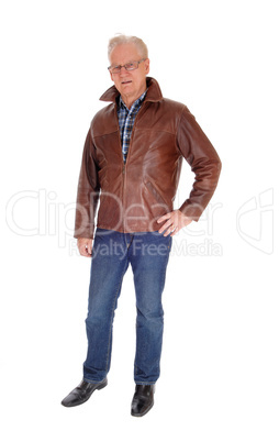 Senior man in leather jacket standing.