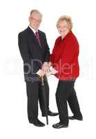 Beautiful senior couple with umbrella.