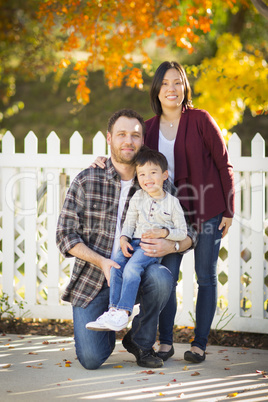 Mixed Race Young Family Portrait Outdoors
