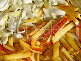 Fried potato chips and cutting onions