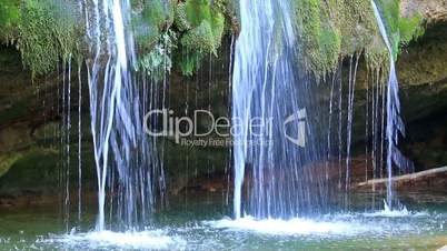 Beautiful veil cascading waterfalls in Campdevanol, Spain