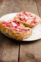 Whole grain rolls with raspberry jam