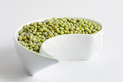 Beans in white ceramics bowl