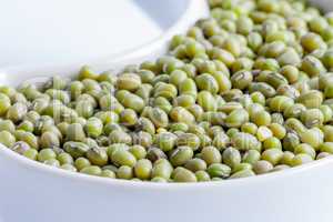 Beans in white ceramics bowl