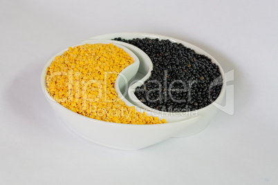 Multicolored beans in ceramics bowl