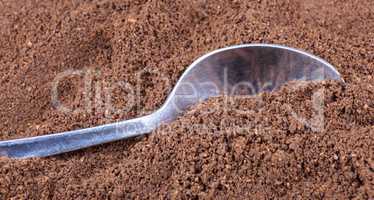 milled coffee  and teaspoon