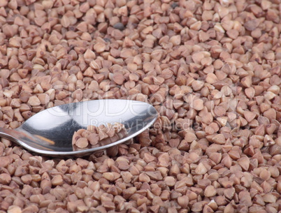 buckwheat background and teaspoon