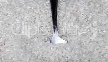 rice background and teaspoon