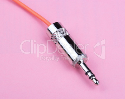 Stereo Male Plug Connector on Pink Background