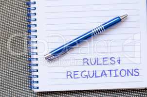Rules and regulations write on notebook