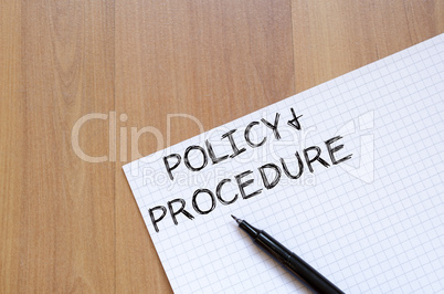 Policy and procedure write on notebook