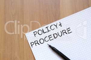 Policy and procedure write on notebook