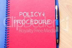 Policy and procedure write on notebook