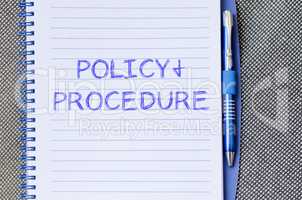 Policy and procedure write on notebook