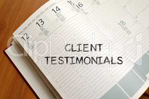 Client testimonials write on notebook