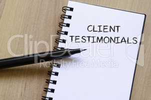 Client testimonials write on notebook