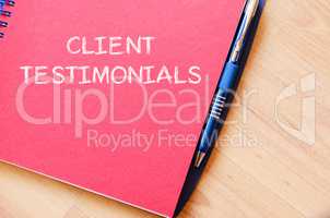 Client testimonials write on notebook