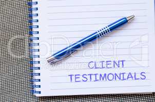 Client testimonials write on notebook