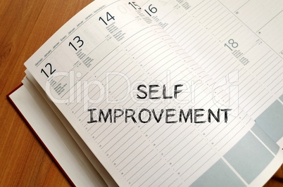 Self improvement write on notebook