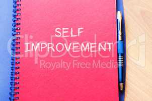 Self improvement write on notebook