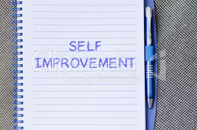 Self improvement write on notebook