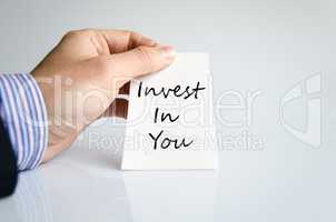 Invest in you text concept