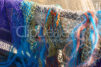 Colored fishing nets in a Dutch fishing port.