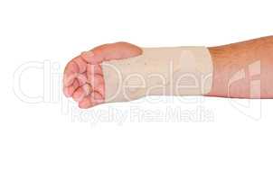 Beigefarbener Verband für das Handgelenkt