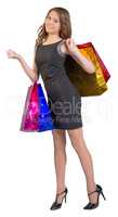 Shopping woman holding bags, isolated on white studio background