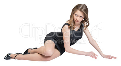 Glamorous caucasian woman lying on the floor studio isolated white background