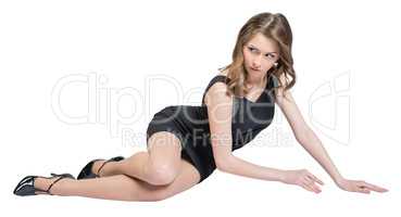 Glamorous caucasian woman lying on the floor studio isolated white background