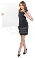 Business woman holding a large blank billboard and shows sign ok