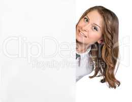Girl looks out from behind an empty poster