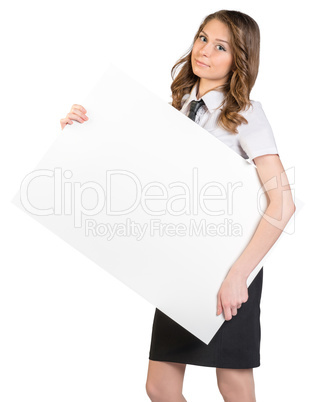 Business woman holding a large blank billboard