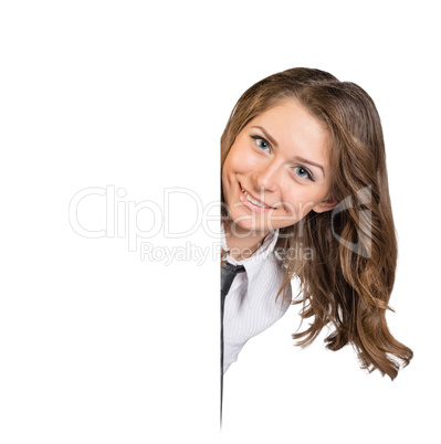 Woman looks out from behind an empty poster