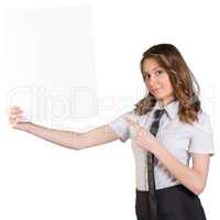Young girl pointing at a blank billboard