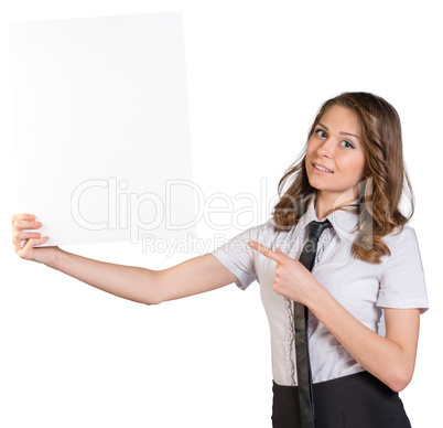 Business woman pointing to blank poster.
