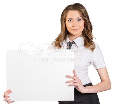 Business woman holding a blank sheet of paper.
