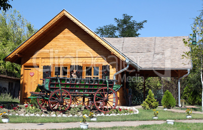 old wooden house and coach