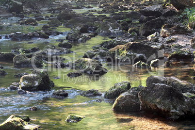mountain creek with stones