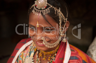 Traditional Indian female in sari smiling
