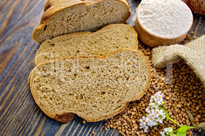 Bread buckwheat with groats and flower on board