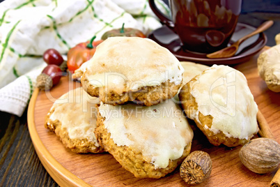 Cookies pumpkin with cup and spices on tray