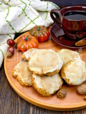 Cookies pumpkin with cup on tray