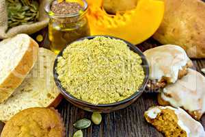 Flour pumpkin in bowl with baking on board