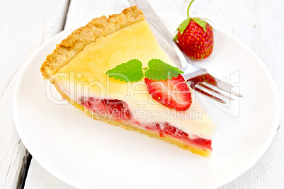 Pie strawberry with sour cream in dish on board