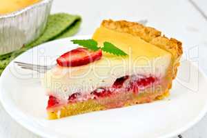 Pie strawberry with sour cream in dish on light board