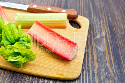 Rhubarb with knife on board