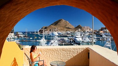 Breakfast on the balcony of the hotel with scenic views of the port of Cabo San Lucas, California, Mexico