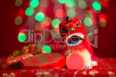 Chinese New Year decorations on red glitter background